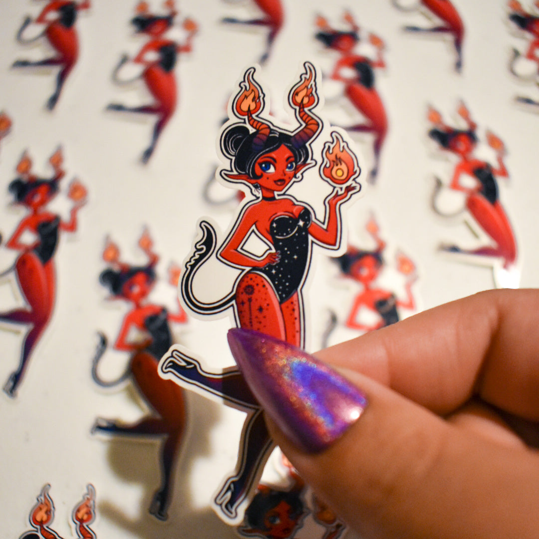 Witch Sticker of a lady devil holding flames on her hands