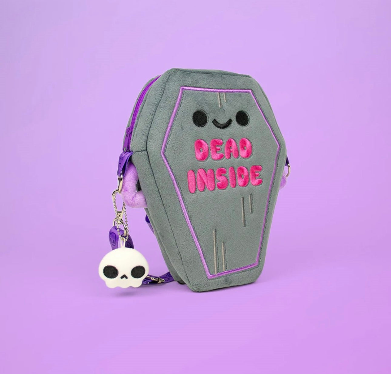 100% Soft Plushy Coffin Bag. The purse has a embroidered smiley face with the words “Dead Inside”. 