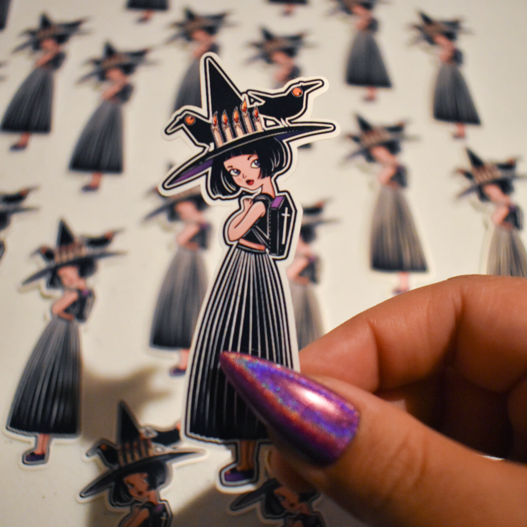Cute witch girl with crows sticker